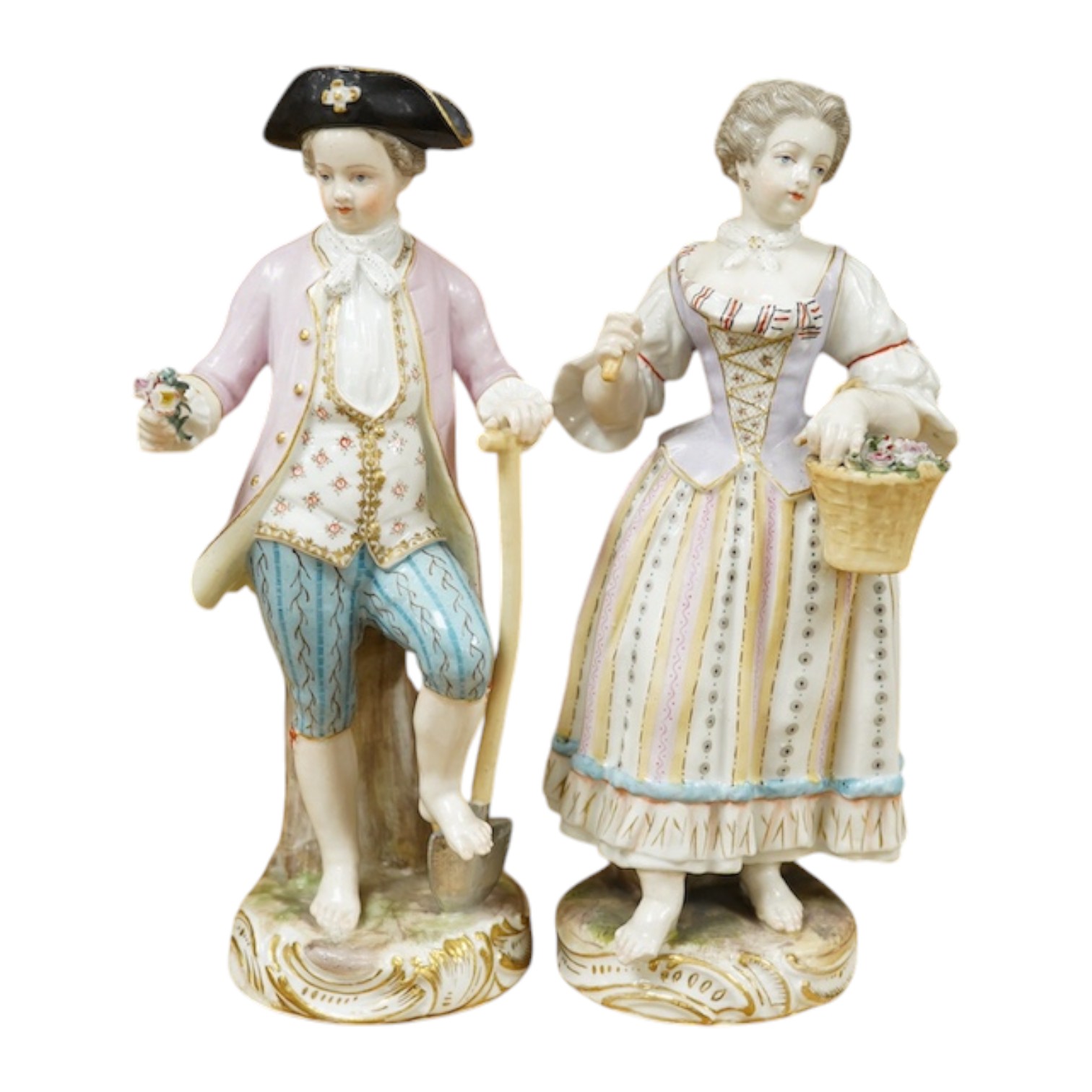 A pair of Meissen style porcelain figures of flower sellers, largest 20.5cm high. Condition - fair, some chipping and losses